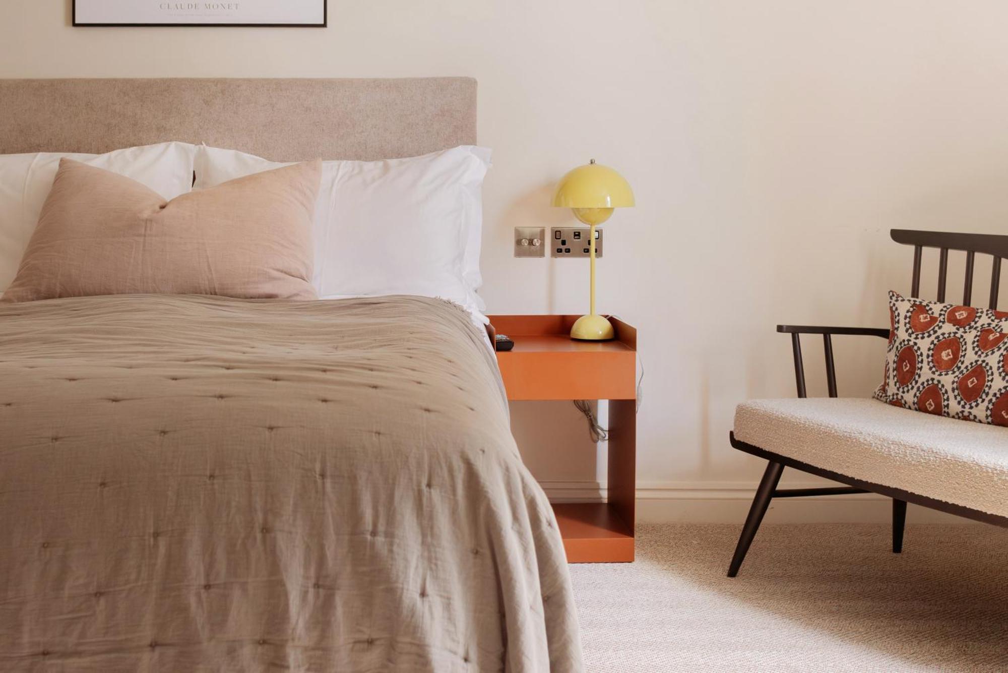 Leighton House - Boutique Guesthouse Bath Exterior photo A bedroom with a bed, a chair and a bedside table